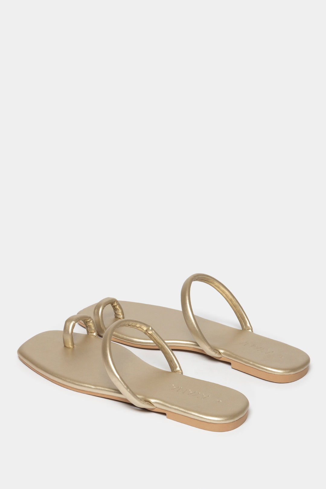 Fera Slide-In Sandals in metallic gold with single vamp strap and toe-post design.