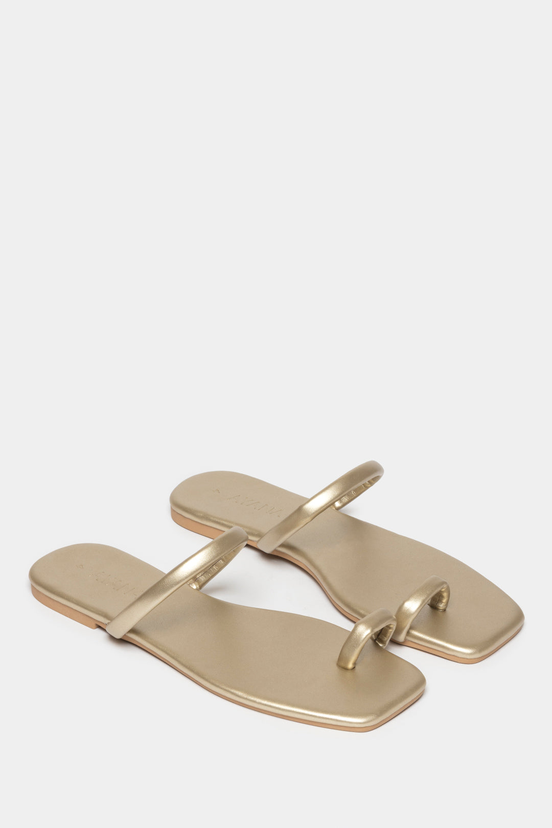 Fera Slide-In Sandals in gold with a toe-post and single vamp strap, perfect for stylish laid-back dressing.