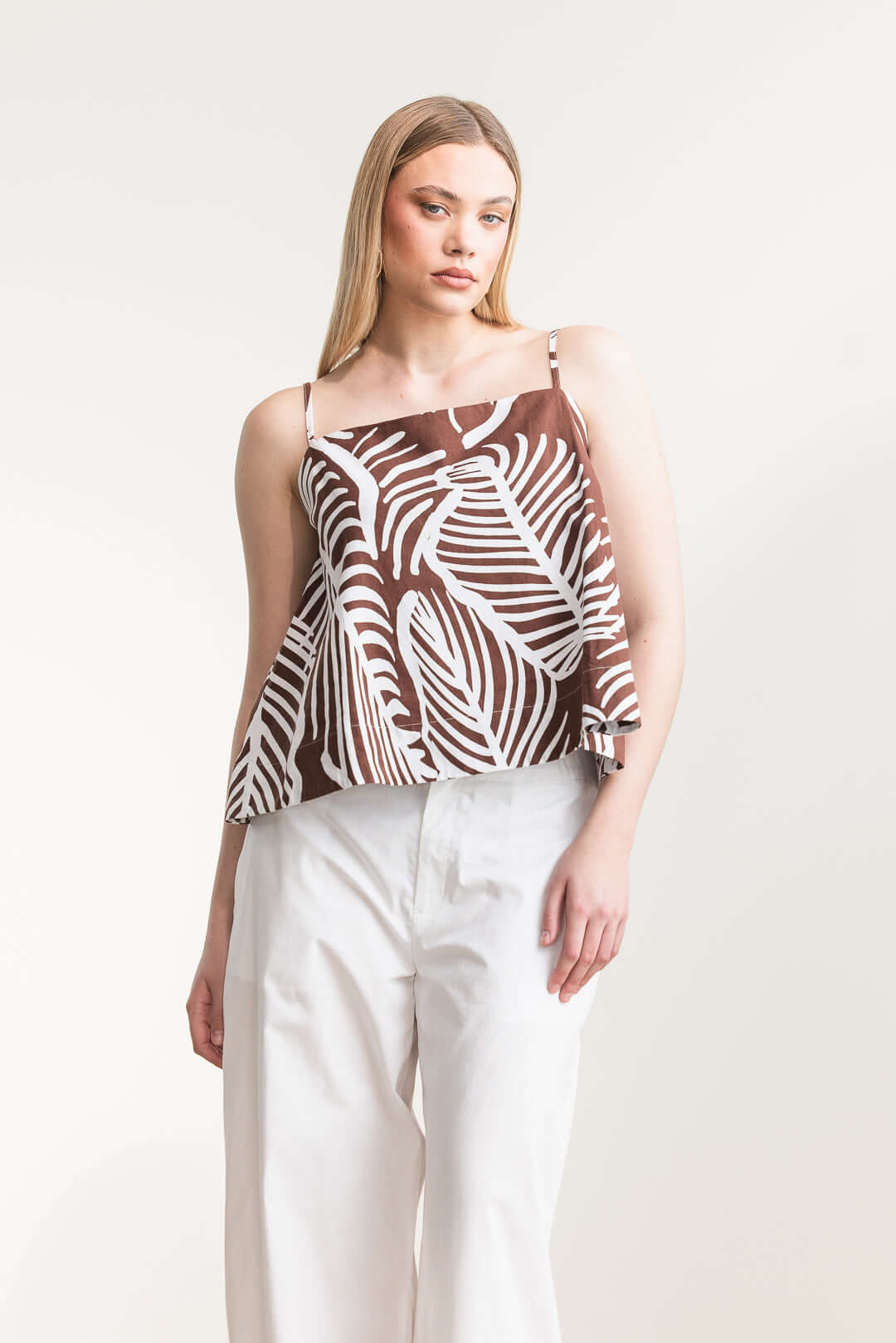 Jesca Cami Top featuring a breezy printed design, relaxed A-line cut, and adjustable shoulder straps for comfort.